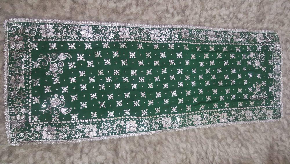 Potret bentuk kain Tudung Manto (facebook.com/Tudong Manto)