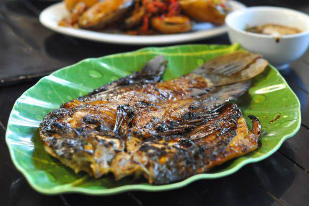 Ilustrasi ikan bakar. https://www.istockphoto.com/id/portfolio/Junard?mediatype=photography