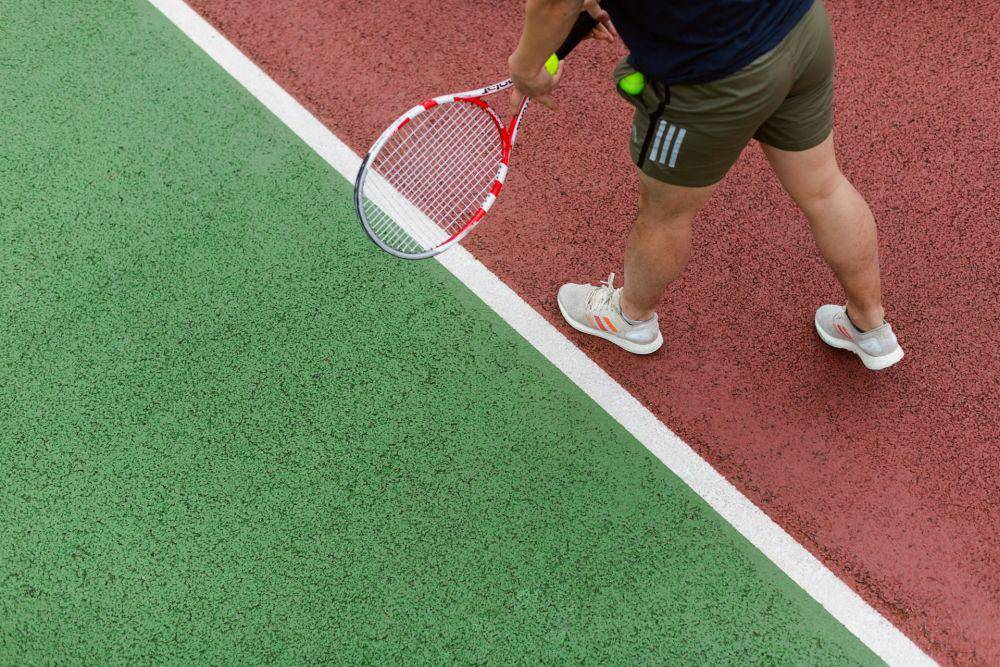 Pemain tenis lapangan (unsplash.com/Thisisengineering)