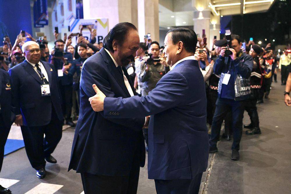 Prabowo Subianto dan Surya Paloh pada Kongres III NasDem di JCC Senayan, Jakarta, Selasa (27/08).  (dok. Tim Komunikasi Prabowo)
