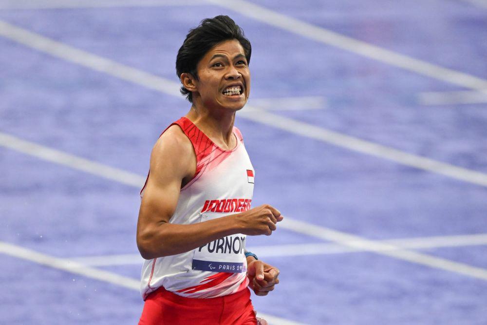 Saptoyogo Purnomo meraih medali perak dari cabang olahraga para atletik nomor 100 meter T37 di Paralimpiade 2024 Paris (dok.NPC Indonesia)