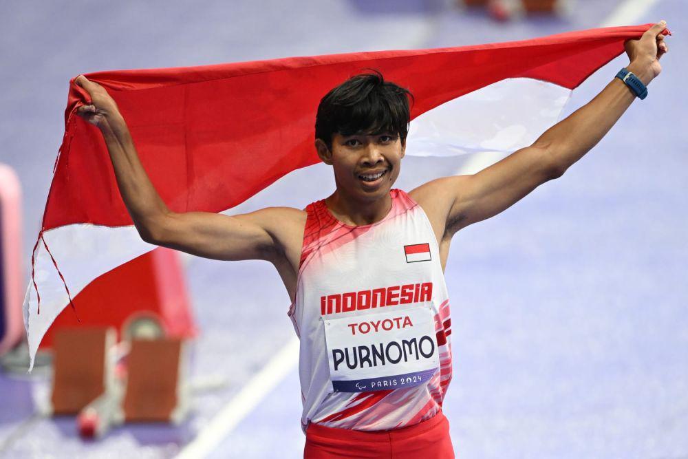 Saptoyogo Purnomo meraih medali perak dari cabang olahraga para atletik nomor 100 meter T37 di Paralimpiade 2024 Paris (dok.NPC Indonesia)