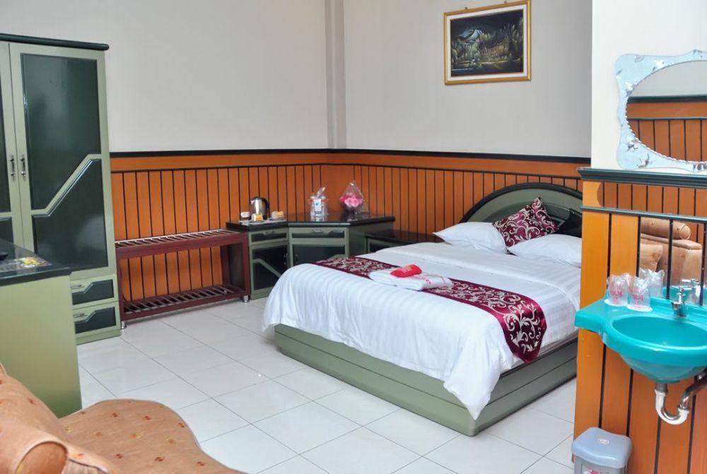Salah satu tipe kamar di Hotel New Merdeka Jember. Instagram/merdekahoteljember