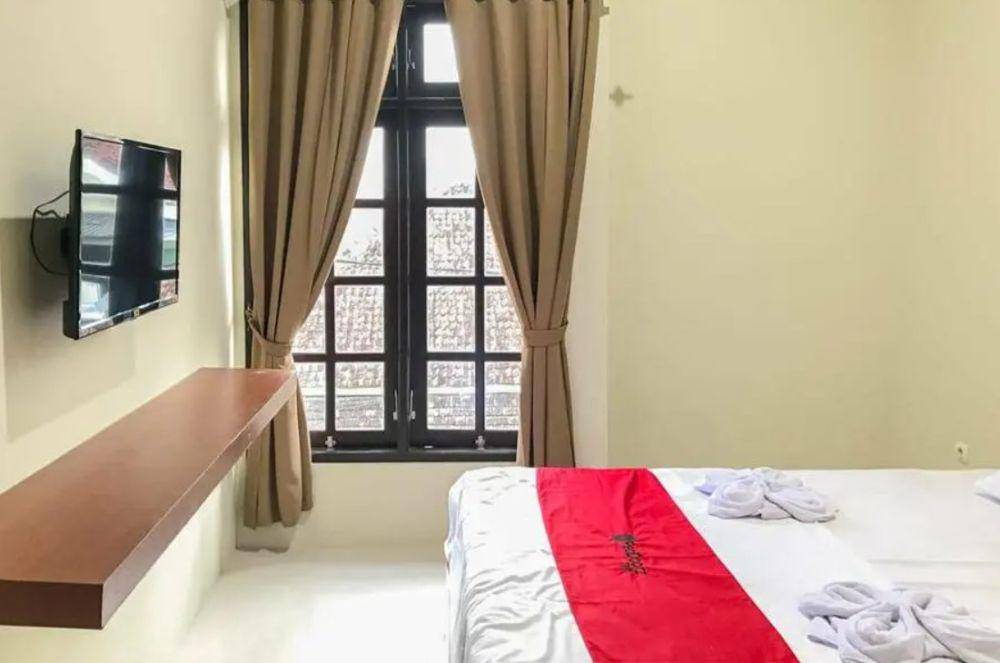 Fasilitas kamar di RedDoorz Syariah. (website.com/reddoorz.com)
