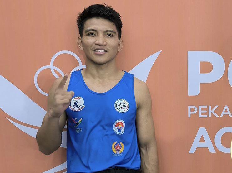 Atlet Muaythai, Jalu Aji Darma Suseno berhasil menyabet medali emas untuk Jawa Tengah di PON Aceh-Sumut 2024, Selasa (10/9/2024). (dok. KONI Jateng)