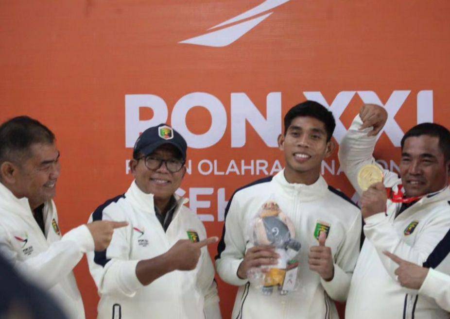 Abdul Muis, atlet Muaythai Lampung meraih emas ke-9 dalam ajang PON XXI Aceh-Sumut 2024. (Dok. Pemprov Lampung).