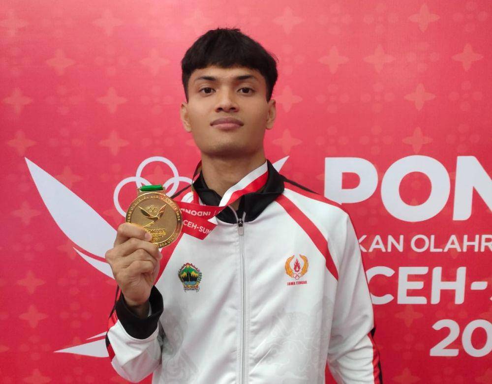 Atlet kontingen Jawa Tengah dari cabor pencak silat, Ginting Baharudin Putra menyumbang emas di PON XXI Aceh-Sumut 2024. (dok. KONI Jateng)