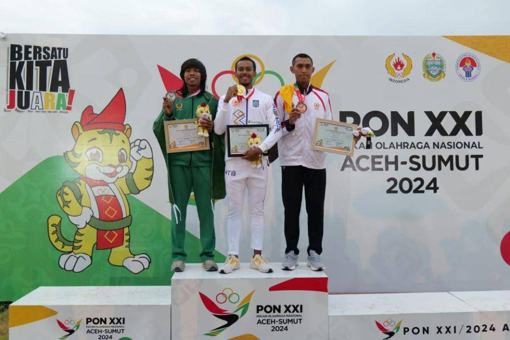 Atlet atletik NTB Sapwaturrahman kembali mempersembahkan medali emas untuk NTB di PON Aceh-Sumut 2024. (dok. KONI NTB)