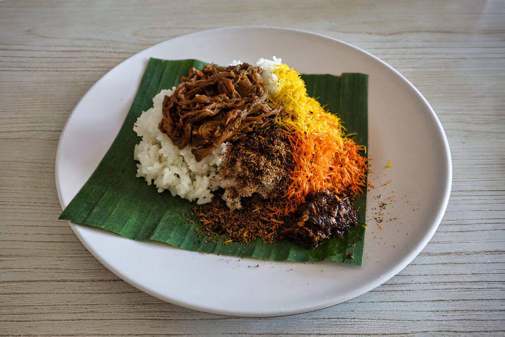 Ilustrasi nasi krawu (istockphoto.com/Galeh Kholis Pambudi)