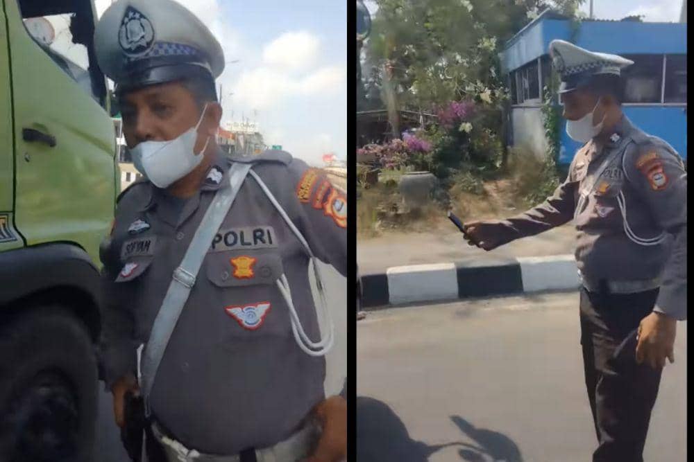 Viral video polisi lalu lintas cekcok dengan sopir truk di Makassar. (Dok. Istimewa)