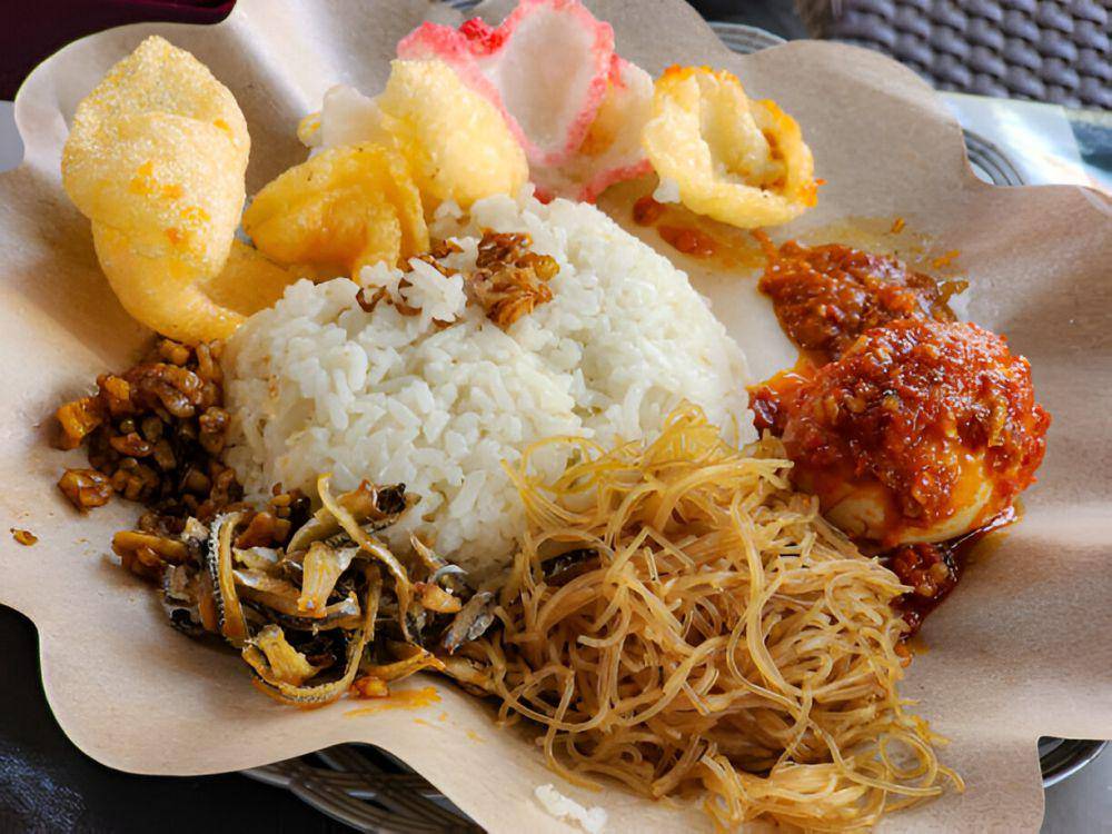 Ilustrasi nasi uduk. (istockphoto.com/Kathleen Juanda Teo)