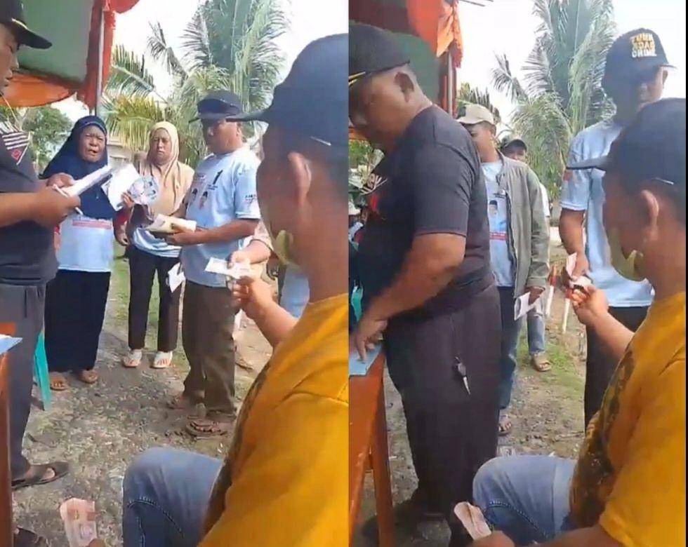 Tangkap layar momen warga berkaus paslon Bupati-Wakil Bupati Lampung Tengah nomor urut 1, Musa-Ahsan terima bagi-bagi uang Rp100 ribu. (IDN Times/Istimewa).