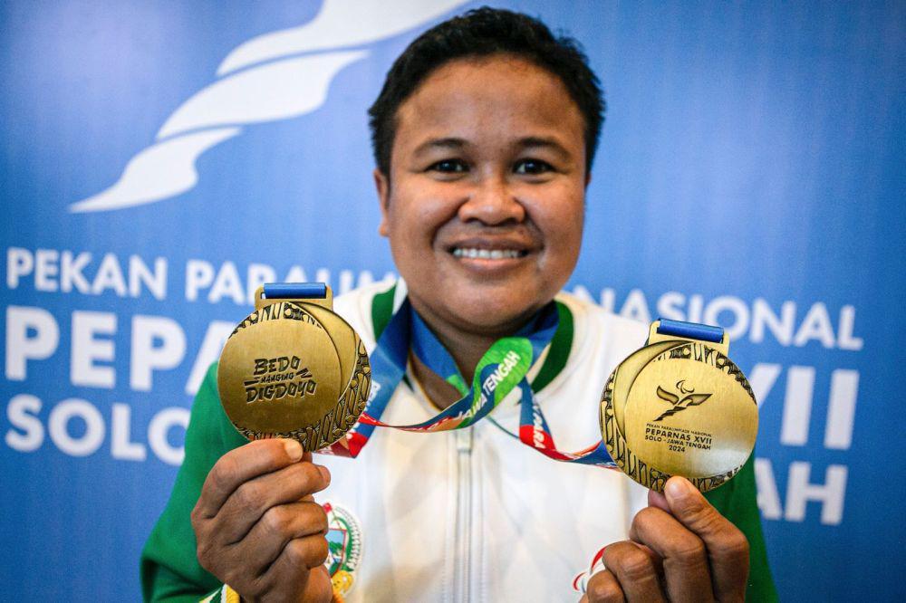 Lifter Sumut Raih 2 Emas dan Cetak Rekor di Peparnas XVII Solo