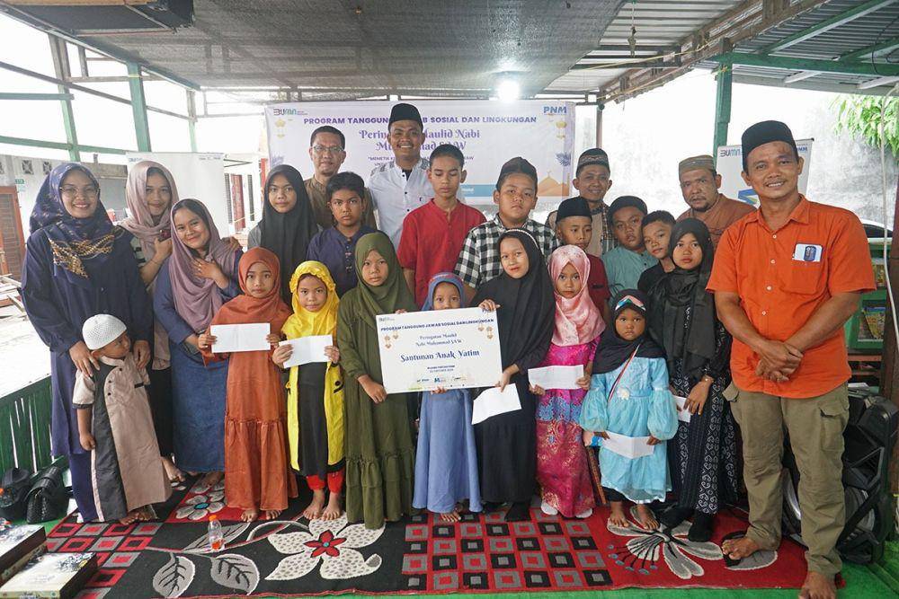 Kegiatan Maulid Nabi Muhammad SAW di Ruang Pintar PNM Baitul Ilmi, Desa Sambirejo Timur Kecamatan Percut Sei Tuan Kabupaten Deli Serdang (IDN Times/Arifin Al Alamudi)