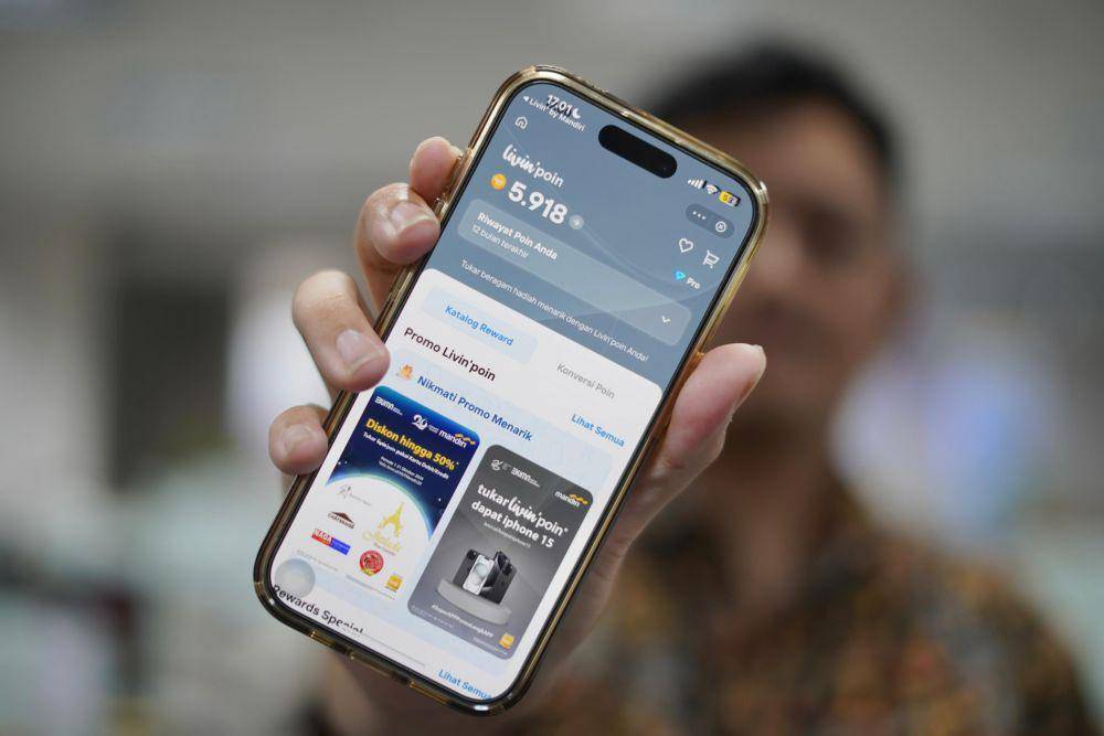 Melalui inovasi-inovasi digital yang selalu menjadi andalan, Bank Mandiri memperkenalkan fitur terbaru dalam Beyond Super App Livin' by Mandiri, yakni Livin'poin.  (Dok. Bank Mandiri)