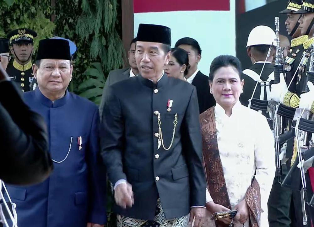 Presiden Jokowi dan Iriana tiba di Gedung MPR/DPR untuk hadiri pelantikan presiden dan wapres terpilih 2024-2029, Prabowo-Gibran pada Minggu (20/10/2024). (youtube.com/MPRGOID)