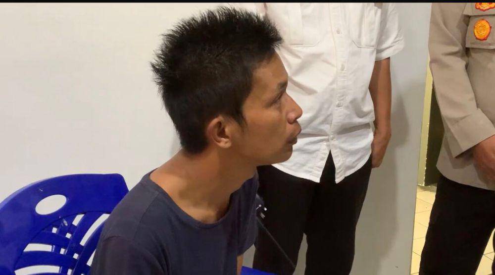 Andreas saat diwawancarai di Mapolsek Pauh (Foto: IDN Times/ Halbert Caniago)