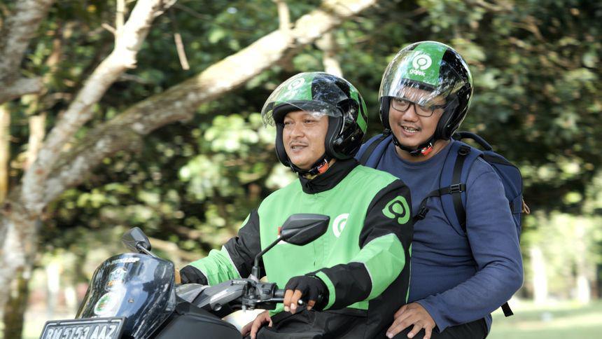 ilustrasi penumpang dan driver Gojek (gojek.com)
