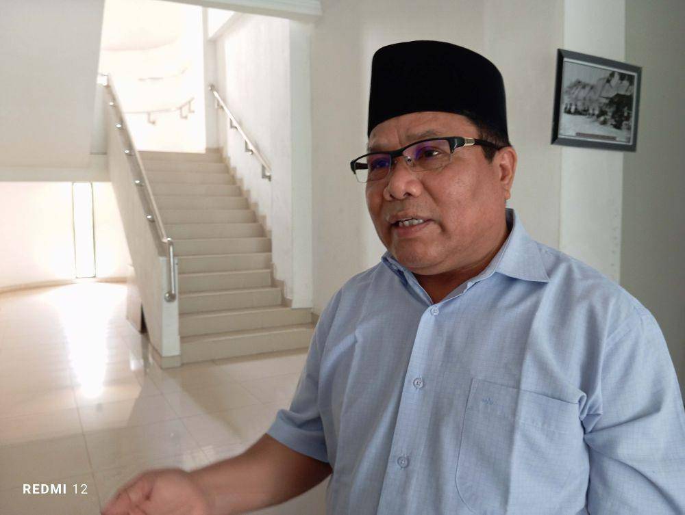 Kepala Dinas DP3AKB Lotim, H Ahmat (IDN Times/Ruhaili)