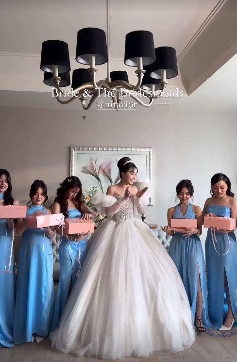 bridesmaid Nita Vior (Instagram.com/axioo.ontheday)