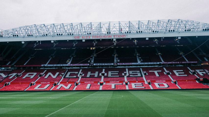 Ilustrasi stadion Old Trafford milik Manchester United. (unsplash.com/colin+meg)
