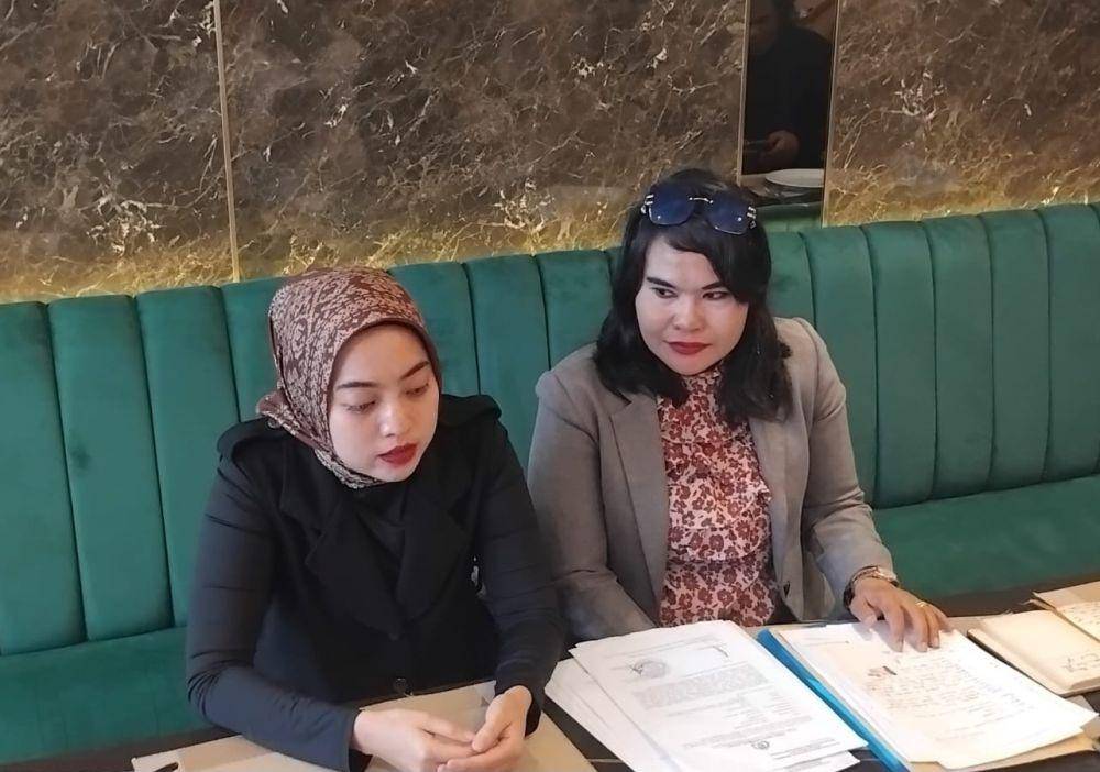 Yunita Tri Kumalasari bersama kuasa Hukum Mardiana Sitorus (Dok: Kuasa Hukum)