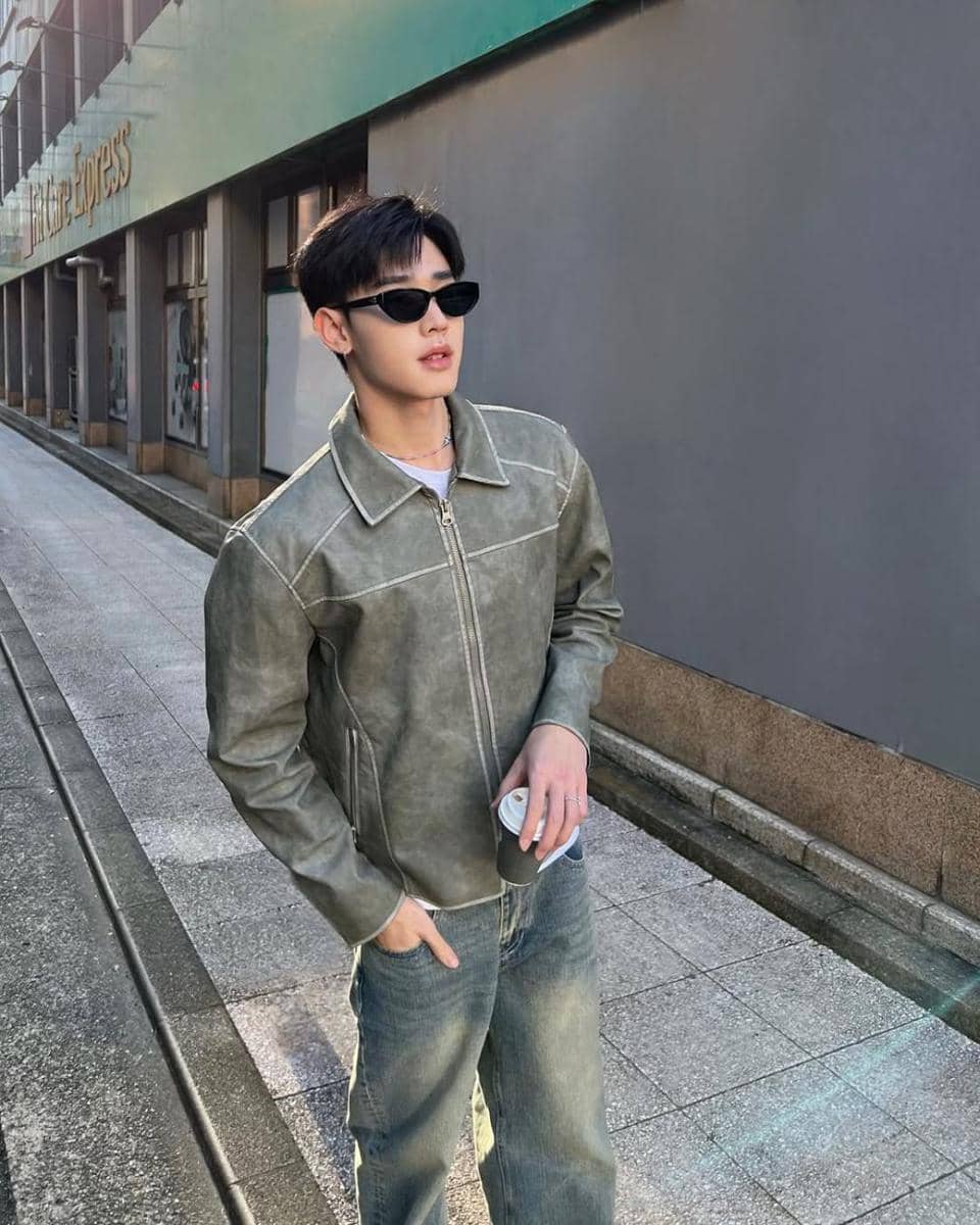 potret outfit dengan washed jeans ala Ryu Phudtripart (instagram.com/ryuptb)