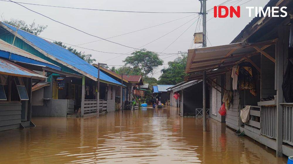 Banjir di Dusun Teknik, Desa Masabang Sangatta Selatan, Kutai Timur. Minggu (26/1/2025) kemarin.