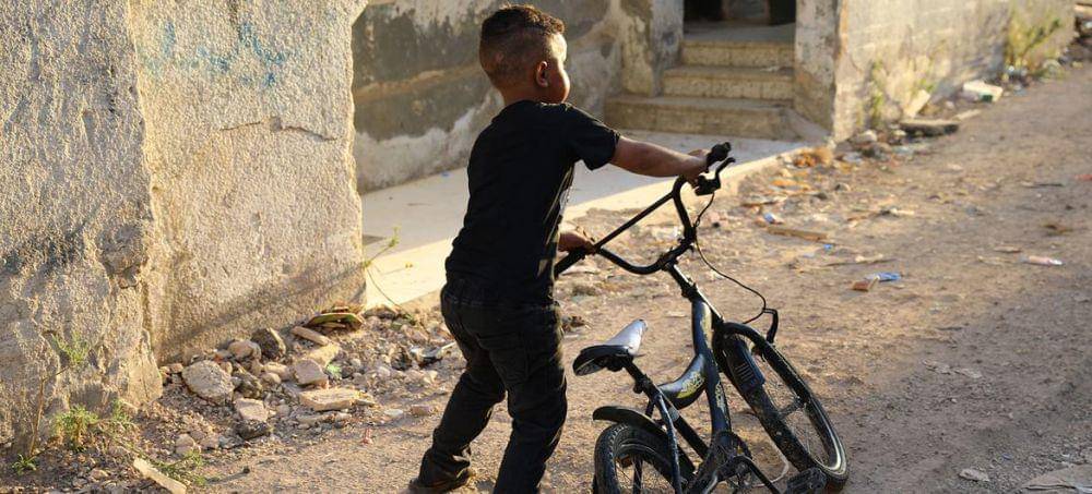 Anak Kecil Bermain Sepeda di Jenin, Tepi Barat news.un.org