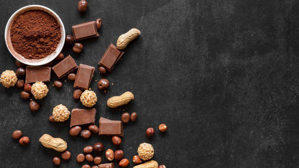 ilustrasi coklat bubuk dan kacang (freepik.com/freepik)