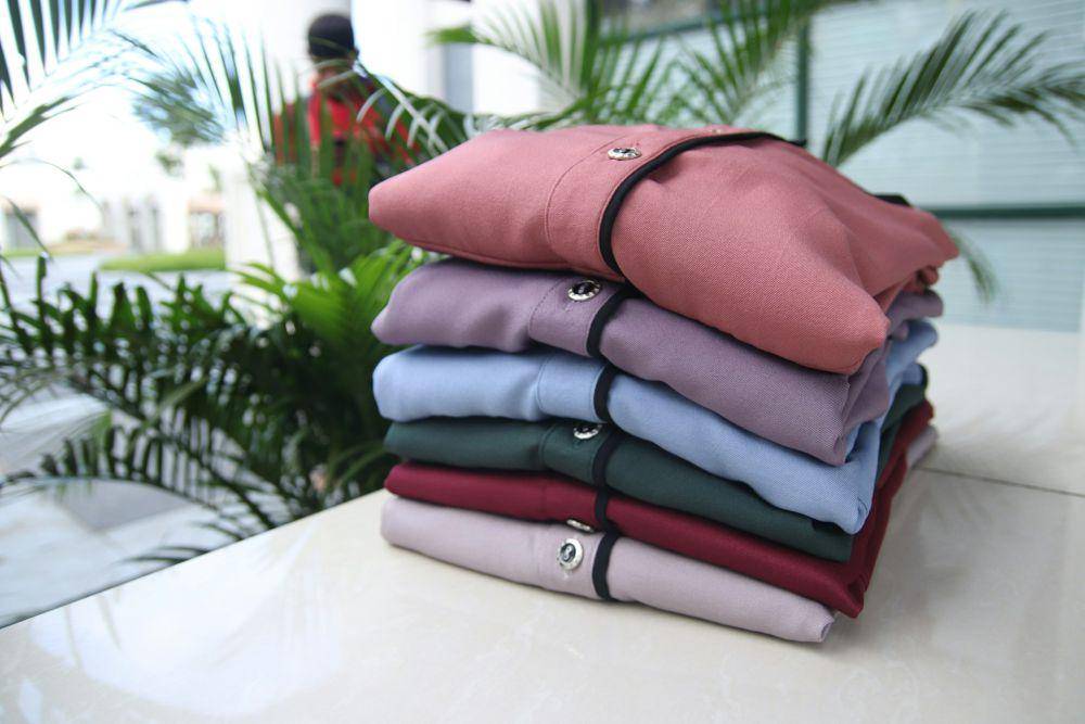 Tumpukan baju. (Unsplash.com/Abi Ghouta Timur)