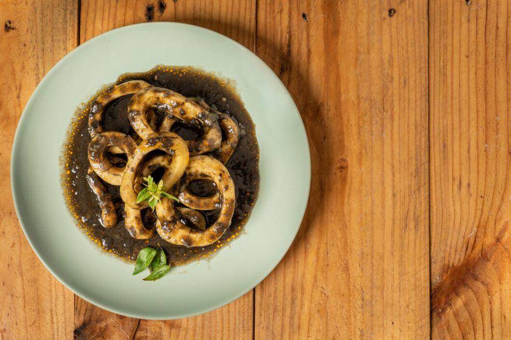 Ilustrasi cumi masak hitam (freepik.com/wirestock)