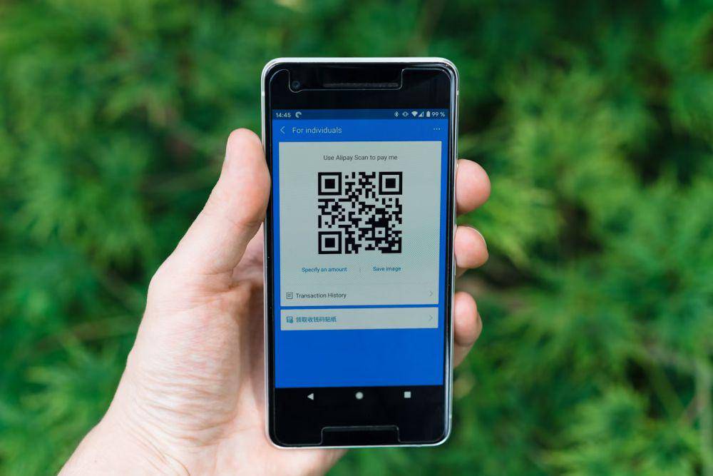 ilustrasi QR code payment (unsplash.com/Markus Winkler)