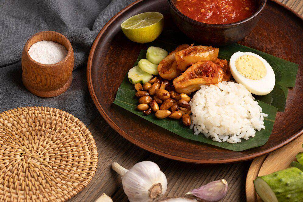 Ilustrasi nasi lemak sebagai menu buka puasa. (freepik.com)