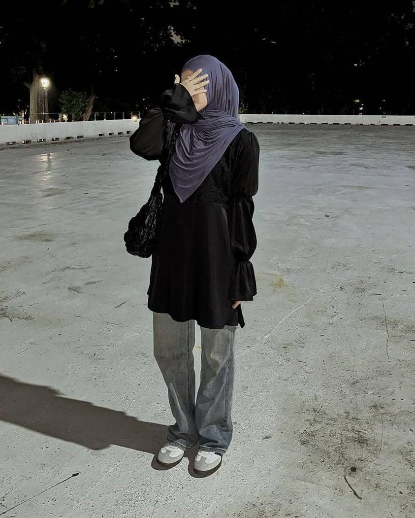 potret inspirasi busana ala Henny Rahman