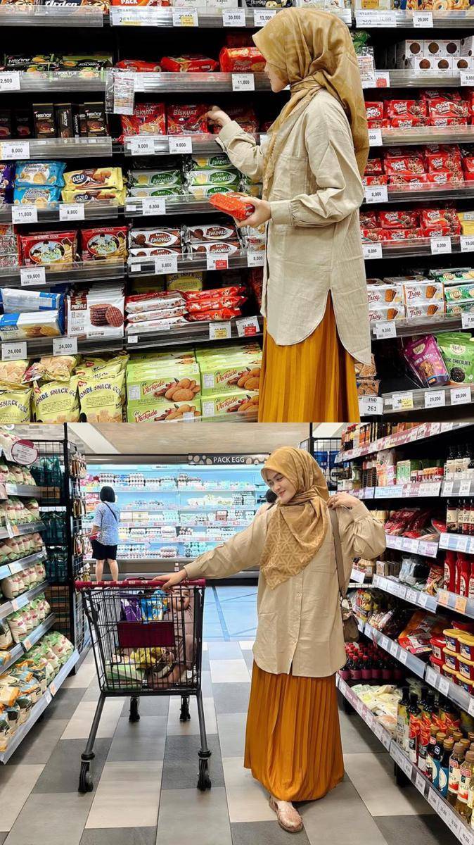 potret busana muslim ala Henny Rahman