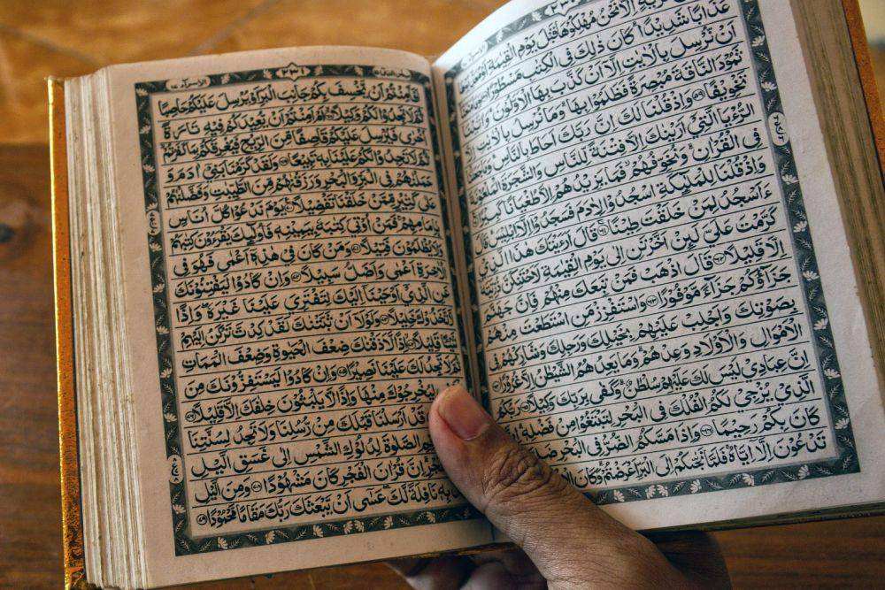 ilustrasi membaca Al-Quran (pixabay.com/Ali Burhan)
