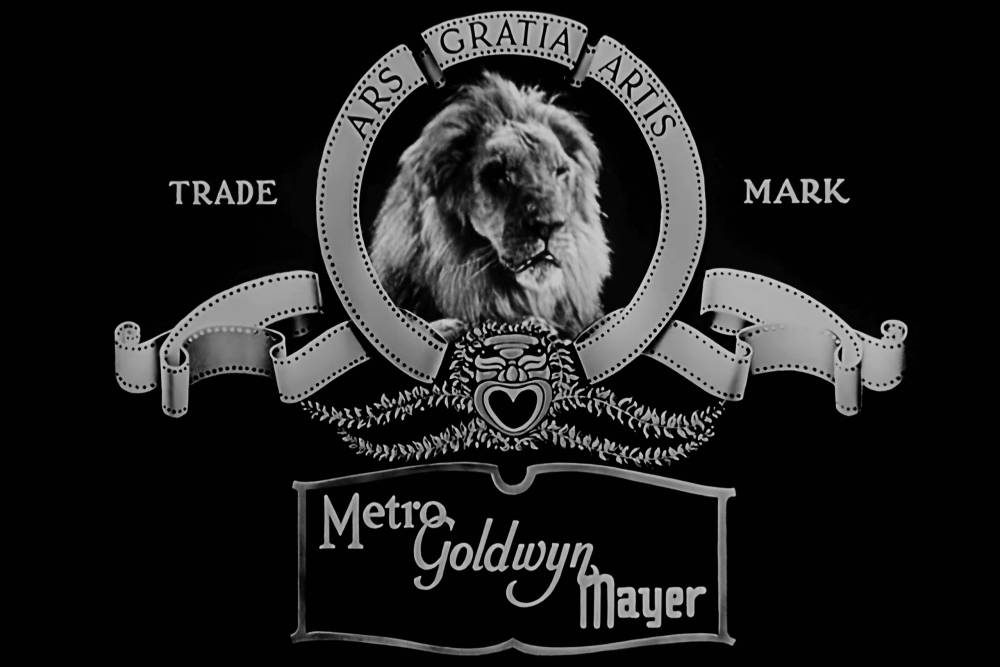 logo Metro Goldwyn Mayer dalam film hitam-putih, dengan Jackie the Lion (commons.wikimedia.org/Metro-Goldwyn-Mayer)