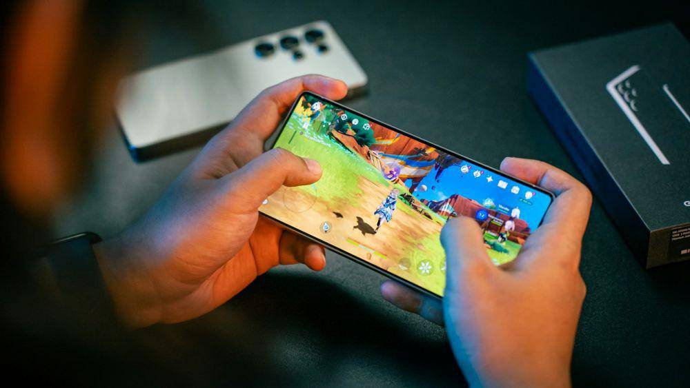 ilustrasi main mobile game (unsplash.com/@amanz)
