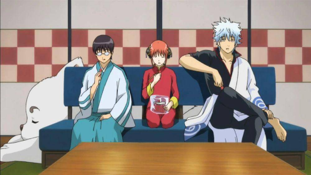 Cuplikan Gintoki dan para anak buahnya sedang menonton TV. (dok. Sunrise/Gintama)
