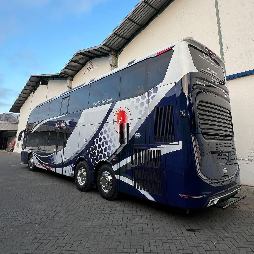 ilustrasi sleeper bus unicorn indorent
