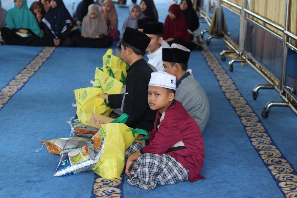 Ilustrasi pembagian zakat (pexels.com/Refi Muhammad Ridha)