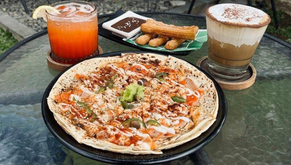 Salah satu kafe bernama D'Flow and Eatery di Kota Medan menjadi tempat yang menawarkan konsep unik (Dok. Istimewa)