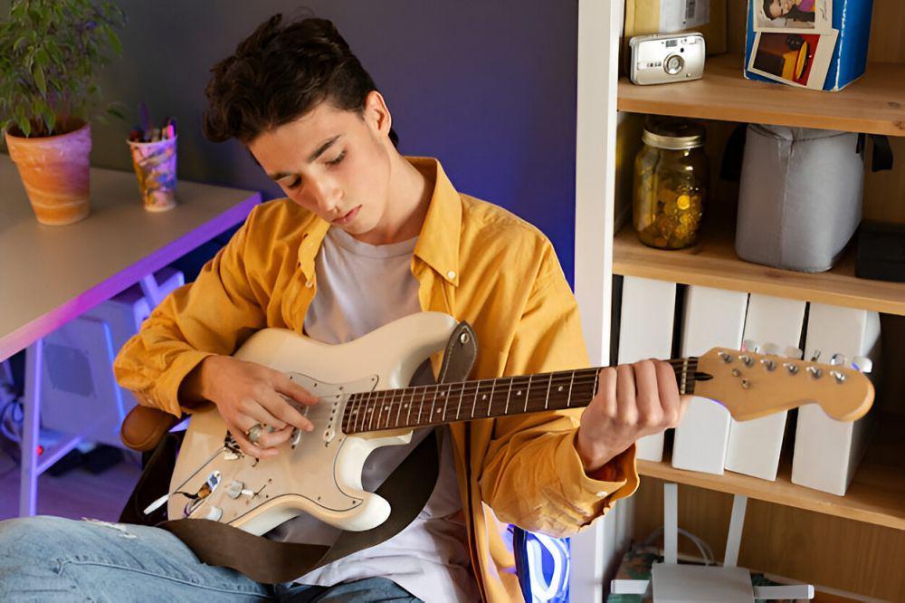 ilustrasi pria bermain gitar (freepik.com/freepik)