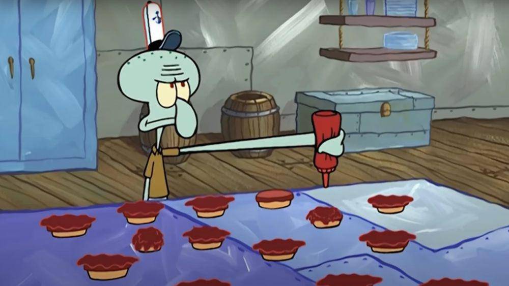 Squidward Tentacles memasakan Krabby Patty (dok. Nickelodeon/SpongeBob SquarePants)