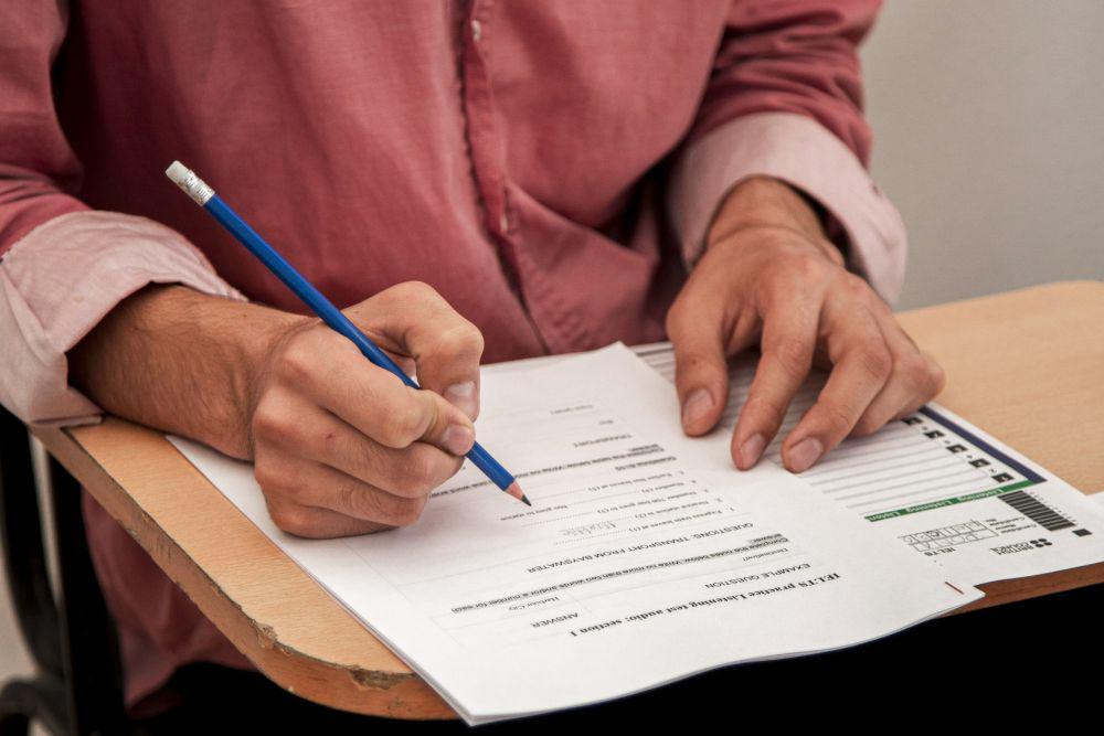 Taking examination or job application form filling from Freepik