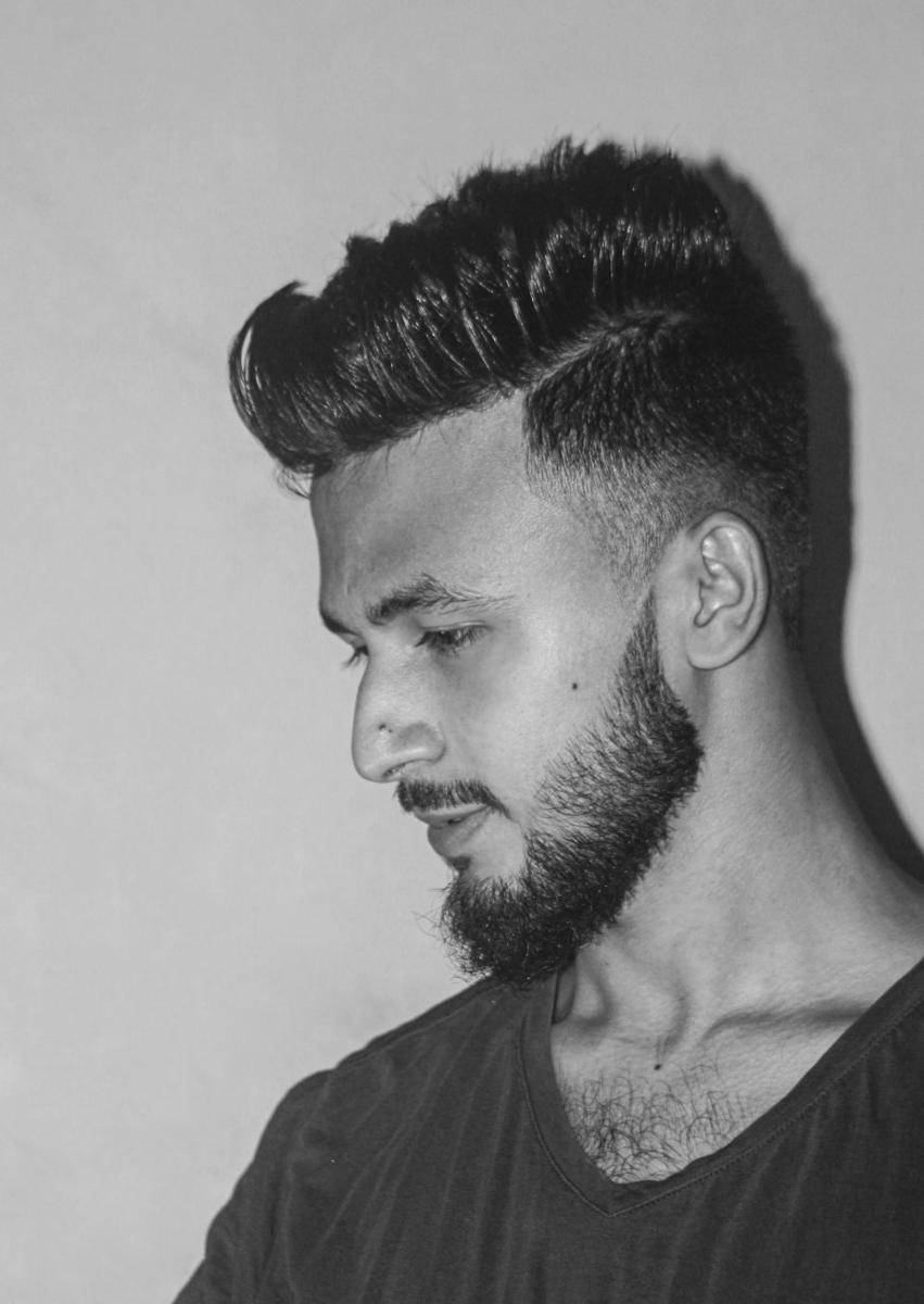 ilustrasi gaya rambut low taper fade (unsplash.com/Shamsul Alam Topu)