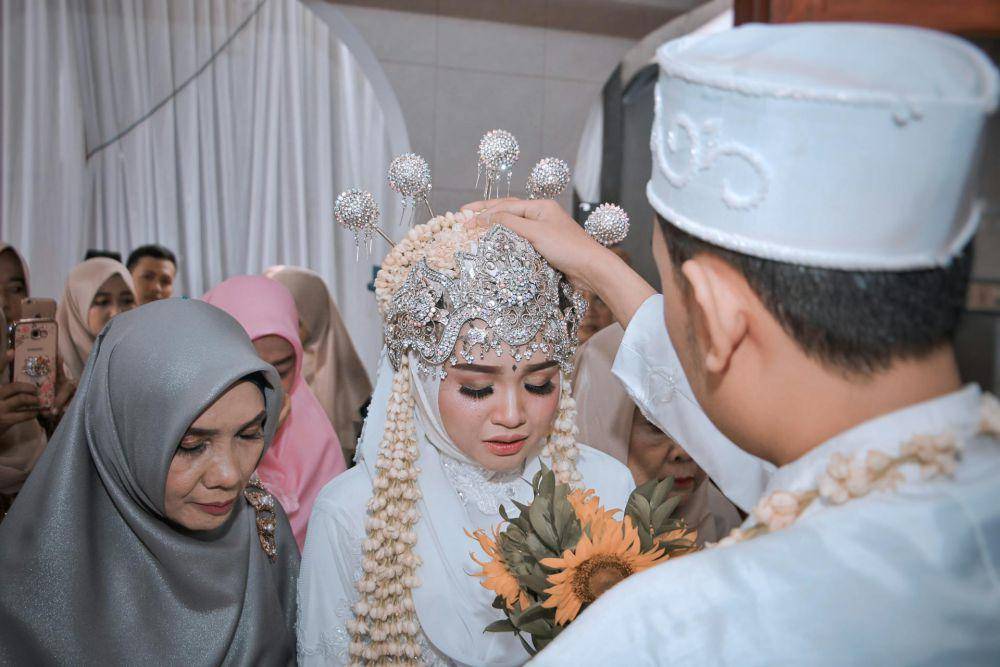 ilustrasi momen berdoa setelah akad nikah (pexels.com/Muhamad Faizal Awal)