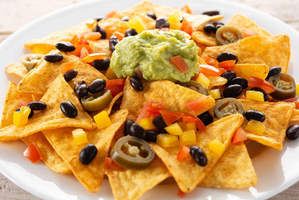 ilustrasi nachos (freepik.com/chandlervid85)