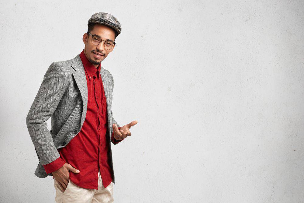 ilustrasi outfit pria warna merah (freepik.com/wayhomestudio)